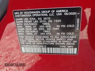 2021 Volkswagen Atlas SE z VIN 1V2WR2CA3MC526612, wystawiony jako IAAI lot #41625077 z przebiegiem 70 856 mil mil oraz . Historia ofert i sprzedaży dostępna na DreamBid. Obrazek 9.