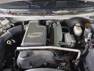 2004 GMC Envoy SLE with VIN 1GKDS13S642118163, listed as a IAAI auction lot 41809472 with 234,353 mi miles. Bid and sale history available at carsss.com. Image 10.