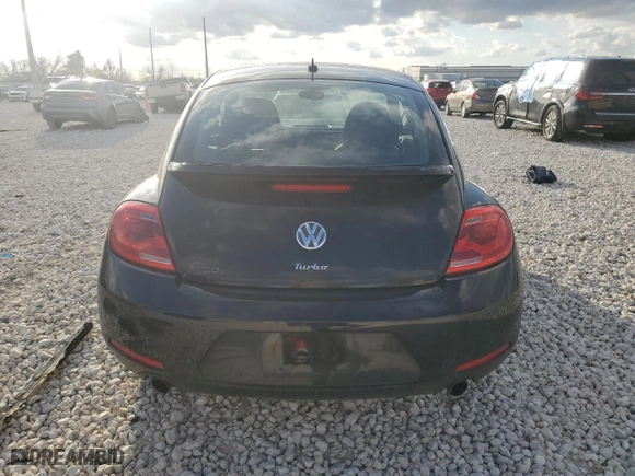 2012 Volkswagen Beetle 2.0T Turbo PZEV with VIN 3VWVA7AT1CM618883, listed as a Copart auction lot 85873174 with 100,482 mi miles and Salvage Title. Bid and sale history available at carsss.com. Image 6.
