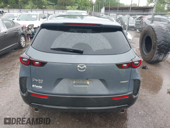 2023 Mazda CX-50 S Premium Plus z VIN 7MMVABEMXPN104518, wystawiony jako IAAI lot #42184893 z przebiegiem 61 991 mil mil oraz . Historia ofert i sprzedaży dostępna na DreamBid. Obrazek 16.