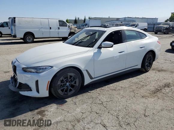 2022 BMW i4 eDrive40 with VIN WBY73AW09NFM42460, listed as a Copart auction lot 59141474 with 0 mi miles and Salvage Title. Bid and sale history available at carsss.com. Image 1.
