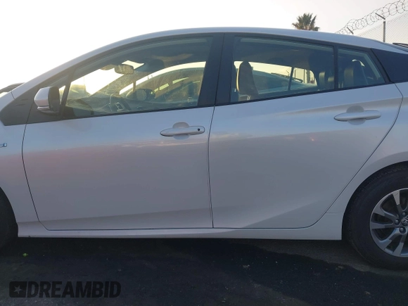 2022 Toyota Prius L Eco with VIN JTDKAMFU1N3181302, listed as a IAAI auction lot 41412650 with 92,397 mi miles and . Bid and sale history available at DreamBid. Image 15.