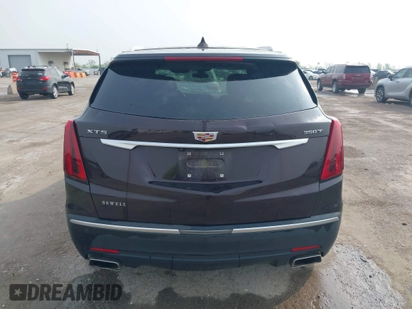 2021 Cadillac XT5 FWD Luxury with VIN 1GYKNAR44MZ184070, listed as a IAAI auction lot 41934265 with 60,596 mi miles and . Bid and sale history available at DreamBid. Image 16.