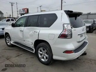 2014 Lexus GX 460 with VIN JTJBM7FX2E5079088, listed as a Copart auction lot 56070915 with 129,822 mi miles and Salvage Title. Bid and sale history available at DreamBid. Image 2.