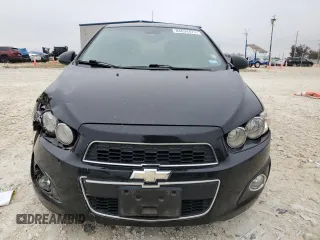 2012 Chevrolet Sonic LTZ z VIN 1G1JE5SB2C4173638, wystawiony jako Copart lot #84634474 z przebiegiem 148 247 mil mil oraz Szkoda całkowita • Salvage title. Historia ofert i sprzedaży dostępna na DreamBid. Obrazek 5.