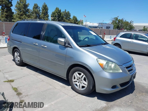 2006 Honda Odyssey EX-L z VIN 5FNRL38716B051664, wystawiony jako IAAI lot #42520320 z przebiegiem 304 835 mil mil oraz . Historia ofert i sprzedaży dostępna na DreamBid. Obrazek 1.