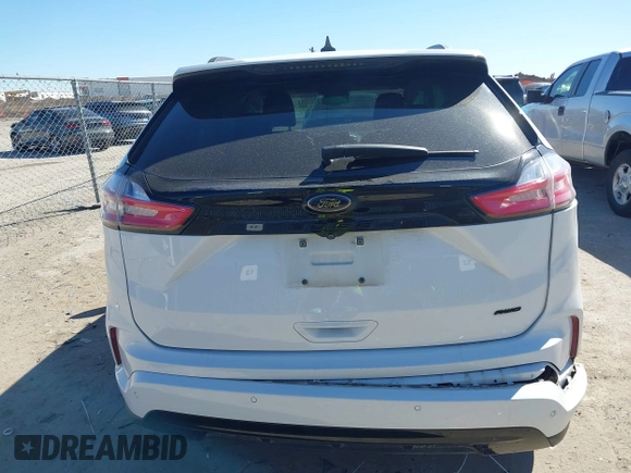 2022 Ford Edge SE z VIN 2FMPK4G96NBA40332, wystawiony jako IAAI lot #41730121 z przebiegiem 85 459 mil mil oraz . Historia ofert i sprzedaży dostępna na DreamBid. Obrazek 17.