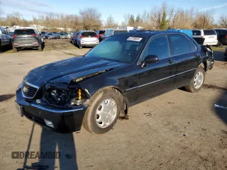 1999 Acura RL with VIN JH4KA9654XC005397, listed as a Copart auction lot 87770895 with 0 mi miles and Salvage Title. Bid and sale history available at carsss.com. Image 1.