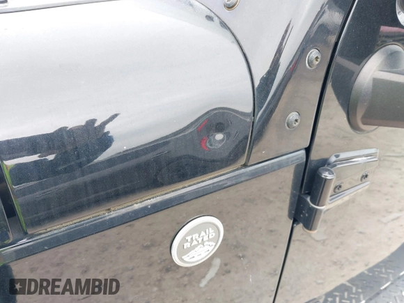 2007 Jeep Wrangler Unlimited X with VIN 1J4GA39177L153387, listed as a IAAI auction lot 42021211 with 207,965 mi miles and . Bid and sale history available at DreamBid. Image 6.