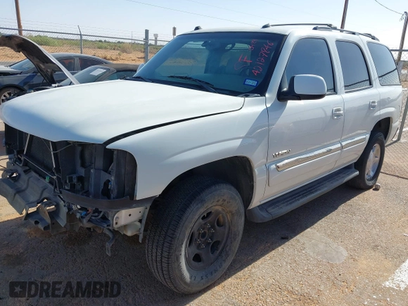 2005 GMC Yukon SLT z VIN 1GKEC13TX5R276234, wystawiony jako IAAI lot #42127846 z przebiegiem 210 802 mil mil oraz . Historia ofert i sprzedaży dostępna na DreamBid. Obrazek 18.