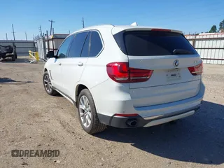 2014 BMW X5 sDrive35i with VIN 5UXKR2C53E0C01692, listed as a IAAI auction lot 41727216 with 135,985 mi miles. Bid and sale history available at carsss.com. Image 3.