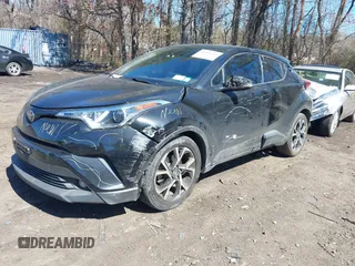 2019 Toyota C-HR XLE with VIN JTNKHMBXXK1019814, listed as a IAAI auction lot 41884485 with 53,101 mi miles. Bid and sale history available at carsss.com. Image 6.