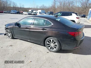 2015 Acura TLX Tech with VIN 19UUB1F51FA014434, listed as a IAAI auction lot 40791595 with 104,757 mi miles. Bid and sale history available at carsss.com. Image 3.