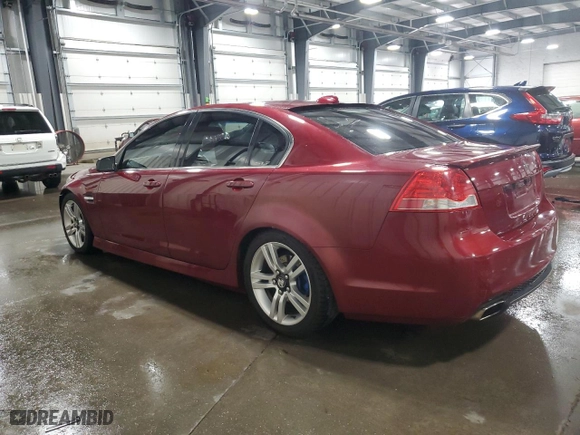 2009 Pontiac G8 with VIN 6G2ER57709L238526, listed as a Copart auction lot 68898454 with 156,021 mi miles and Salvage Title. Bid and sale history available at carsss.com. Image 2.