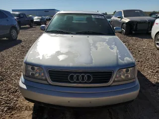 1996 Audi A6 z VIN WAUFA84A9TN007235, wystawiony jako Copart lot #78278774 z przebiegiem 148 857 mil mil oraz Tytuł czysty. Historia ofert i sprzedaży dostępna na DreamBid. Obrazek 5.