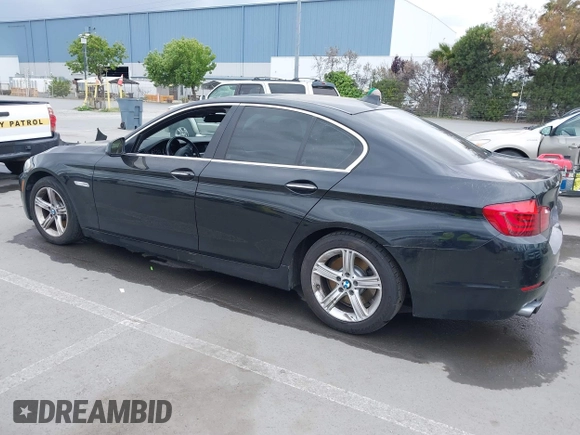2012 BMW 5 Series 528i with VIN WBAXG5C55CDX02405, listed as a IAAI auction lot 42127069 with 155,764 mi miles. Bid and sale history available at carsss.com. Image 3.