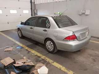 2006 Mitsubishi Lancer ES with VIN JA3AJ26E96U070354, listed as a IAAI auction lot 41572102 with 235,943 mi miles. Bid and sale history available at carsss.com. Image 3.