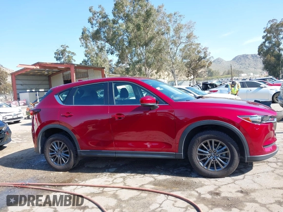 2019 Mazda CX-5 Sport with VIN JM3KFABM0K1633065, listed as a IAAI auction lot 41968786 with 90,407 mi miles and . Bid and sale history available at DreamBid. Image 13.