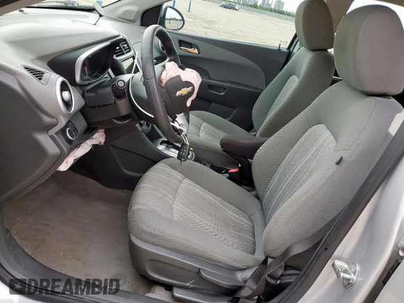 2018 Chevrolet Sonic LT with VIN 1G1JD5SHXJ4118102, listed as a Copart auction lot 60783855 with 63,607 mi miles and Salvage title. Bid and sale history available at DreamBid. Image 7.