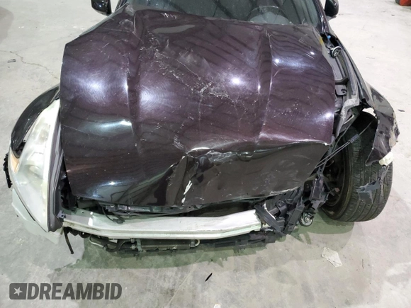 2010 Nissan 370Z Touring с VIN JN1AZ4FH9AM304066, выставлен на аукционе Copart как лот 84176404 с пробегом Не указан миль и На запчасти • Non repairable. История ставок и продаж доступна на DreamBid. Изображение 11.