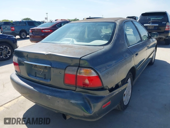 1996 Honda Accord LX with VIN 1HGCD5633TA286104, listed as a IAAI auction lot 42004112 with 186,586 mi miles and . Bid and sale history available at carsss.com. Image 6.