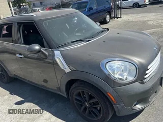 2012 MINI Countryman with VIN WMWZB3C52CWM05723, listed as a Copart auction lot 63713495 with 114,433 mi miles and Clean title. Bid and sale history available at DreamBid. Image 1.