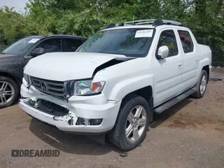 2012 Honda Ridgeline RTL with VIN 5FPYK1F57CB453096, listed as a IAAI auction lot 42206169 with 82,846 mi miles and . Bid and sale history available at DreamBid. Image 6.