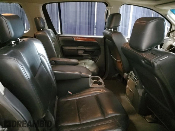 2008 Infiniti QX56 z VIN 5N3AA08D98N909588, wystawiony jako Copart lot #54063755 z przebiegiem 150 723 mil mil oraz Czysty tytuł • Clean title. Historia ofert i sprzedaży dostępna na DreamBid. Obrazek 11.