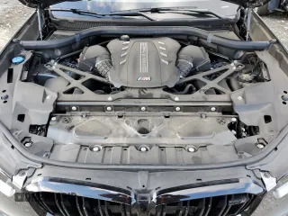 2023 BMW X5 M z VIN 5YMJU0C02P9N97072, wystawiony jako Copart lot #88469815 z przebiegiem 22 395 mil mil oraz Szkody całkowita. Historia ofert i sprzedaży dostępna na DreamBid. Obrazek 12.