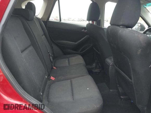 2015 Mazda CX-5 Sport z VIN JM3KE2BE9F0452625, wystawiony jako IAAI lot #42114867 z przebiegiem 167 849 mil mil oraz . Historia ofert i sprzedaży dostępna na DreamBid. Obrazek 8.