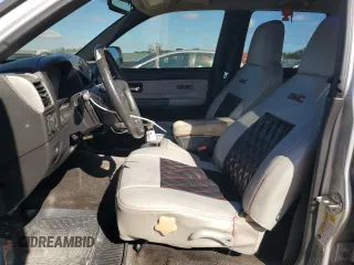 2012 GMC Canyon SLE1 with VIN 1GTD5MFE9C8108474, listed as a Copart auction lot 82650124 with 219,772 mi miles and Salvage Title. Bid and sale history available at carsss.com. Image 7.