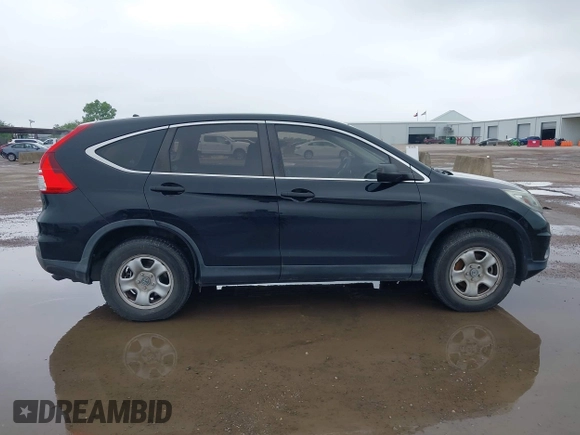 2015 Honda CR-V LX z VIN 3CZRM3H35FG707959, wystawiony jako IAAI lot #42166954 z przebiegiem 97 042 mil mil oraz . Historia ofert i sprzedaży dostępna na DreamBid. Obrazek 13.