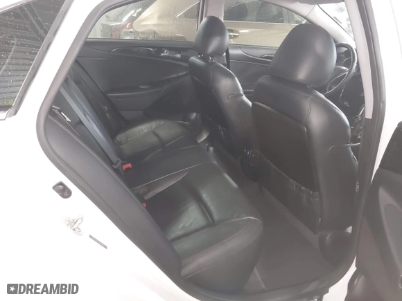 2013 Hyundai Sonata SE with VIN 5NPEC4AC0DH599584, listed as a IAAI auction lot 41961659 with 122,296 mi miles. Bid and sale history available at carsss.com. Image 8.