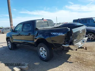 2015 Toyota Tacoma with VIN 3TMLU4EN2FM169326, listed as a IAAI auction lot 40689500 with 77,003 mi miles and . Bid and sale history available at DreamBid. Image 14.