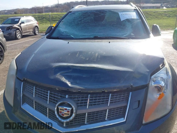 2011 Cadillac SRX Performance Collection with VIN 3GYFNBEYXBS527765, listed as a IAAI auction lot 41904013 with 168,318 mi miles and . Bid and sale history available at carsss.com. Image 6.