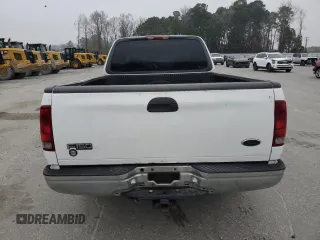 2000 Ford F-150 XL с VIN 1FTZX1725YNB58607, выставлен на аукционе Copart как лот 48706575 с пробегом 286 898 миль миль и Списание • Salvage title. История ставок и продаж доступна на DreamBid. Изображение 6.