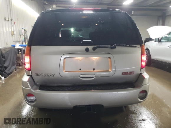 2004 GMC Envoy SLE with VIN 1GKDS13S742369547, listed as a Copart auction lot 51507445 with 119,824 mi miles and Salvage Title. Bid and sale history available at carsss.com. Image 6.
