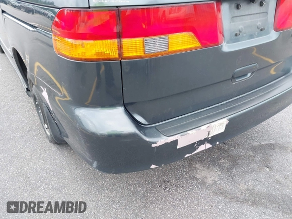 2003 Honda Odyssey EX-L with VIN 5FNRL18963B059910, listed as a IAAI auction lot 42415037 with 267,600 mi miles and . Bid and sale history available at DreamBid. Image 6.
