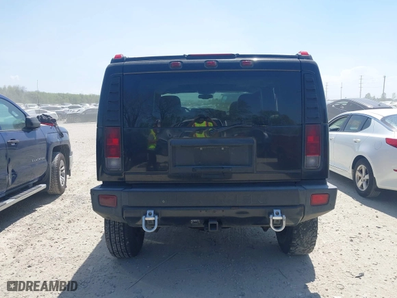2005 Hummer H2 SUV with VIN 5GRGN23U25H128791, listed as a IAAI auction lot 42115436 with 286,818 mi miles. Bid and sale history available at carsss.com. Image 16.