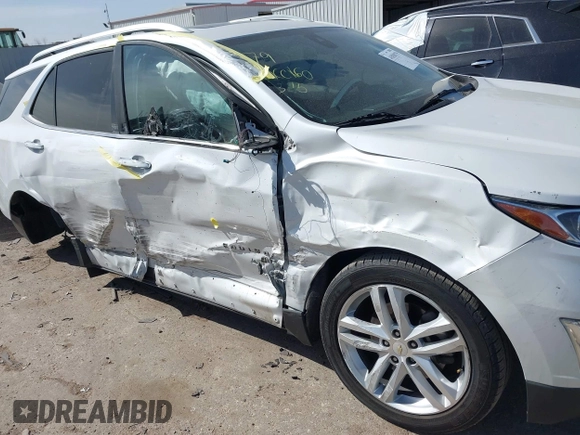2018 Chevrolet Equinox Premier with VIN 2GNAXWEX3J6141427, listed as a IAAI auction lot 41830179 with 76,707 mi miles and . Bid and sale history available at carsss.com. Image 6.