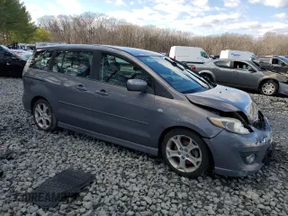 2009 Mazda 5 Sport with VIN JM1CR29L090358157, listed as a Copart auction lot 87040574 with 197,223 mi miles and Salvage title. Bid and sale history available at DreamBid. Image 4.