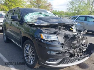 2018 Jeep Grand Cherokee Summit with VIN 1C4RJFJT5JC120523, listed as a IAAI auction lot 42136651 with 75,699 mi miles and . Bid and sale history available at DreamBid. Image 1.