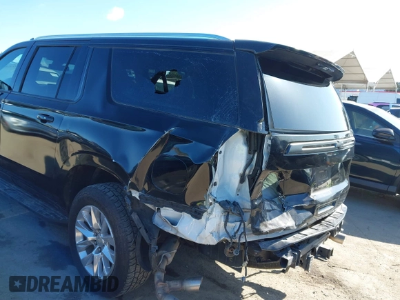 2022 Chevrolet Suburban Premier with VIN 1GNSCFKD9NR159466, listed as a IAAI auction lot 41918002 with 88,005 mi miles and . Bid and sale history available at DreamBid. Image 6.