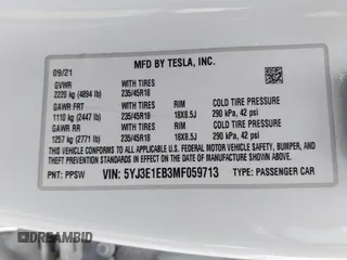 2021 Tesla Model 3 Long Range with VIN 5YJ3E1EB3MF059713, listed as a IAAI auction lot 41778289 with 52,211 mi miles. Bid and sale history available at carsss.com. Image 9.