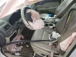 2010 Ford Fusion Hybrid with VIN 3FADP0L30AR381035, listed as a Copart auction lot 59711955 with Not provided miles and Salvage title. Bid and sale history available at DreamBid. Image 7.