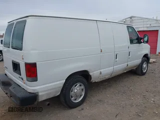 2009 Ford Econoline Cargo Commercial with VIN 1FTNE14W09DA91501, listed as a IAAI auction lot 41473298 with 99,129 mi miles and . Bid and sale history available at DreamBid. Image 4.