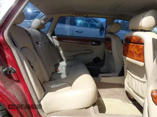 1998 Jaguar XJ Vanden Plas with VIN SAJKX6249WC844067, listed as a IAAI auction lot 42145235 with 117,142 mi miles and . Bid and sale history available at DreamBid. Image 8.