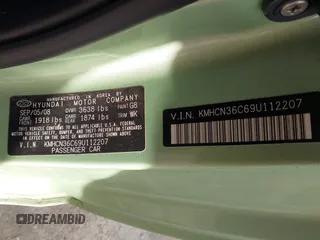 2009 Hyundai Accent Auto SE with VIN KMHCN36C69U112207, listed as a IAAI auction lot 41641298 with 166,804 mi miles. Bid and sale history available at carsss.com. Image 9.