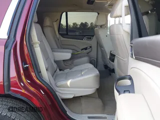 2017 GMC Yukon Denali with VIN 1GKS1CKJ4HR141145, listed as a IAAI auction lot 40799652 with 104,369 mi miles. Bid and sale history available at carsss.com. Image 8.