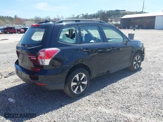 2017 Subaru Forester with VIN JF2SJABC0HH588662, listed as a IAAI auction lot 41931001 with 54,930 mi miles. Bid and sale history available at carsss.com. Image 4.